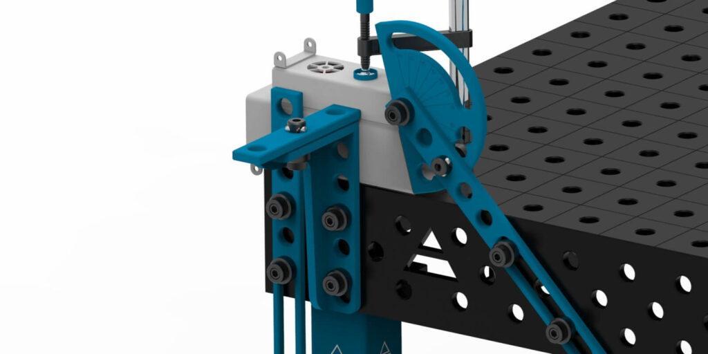 utilização de pernos de ação rápida nas paredes laterais da mesa de soldadura PRO